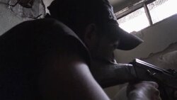Close combat as rebels engage fire on Syrian positions just streets away Instructional Video