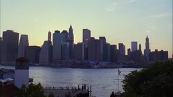 HA WS View of Lower Manhattan skyline from Brooklyn waterfront along Hudson River with view of American International Building, South Street Seaport, and Woolworth Building near Brooklyn Bridge / Manhattan, New York, New York, USA Stock Footage