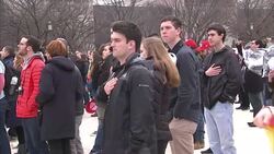 Crowds listening to National Anthem News Clip
