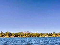 Pond, forest and mountain Stock Footage