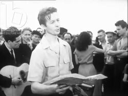 City of Treasures part 3 - man singing to a crowd, paris 1951 Stock Footage