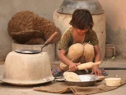 Girl cooking, Faridabad, Haryana, India Stock Footage