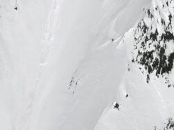 Skier rides steep slope in Alaska Stock Footage