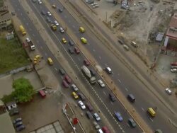 WS AERIAL View of cars running on freeway with footbridge / Minneapolis, Minnesota, United States Stock Footage