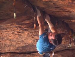MS Shot of male climber climbing crack upside down / Moab, Utah, United States Stock Footage