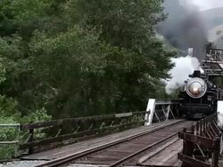 MS TD California Passenger Steam Train Near Livermore   passing from over tressel bridge / Livermore, California, United States Stock Footage