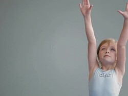  TU instructor helping student on balance beam / Vancouver, British Columbia, Canada Stock Footage
