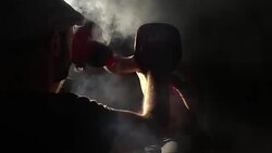 Boxer pad work session with trainer Stock Footage
