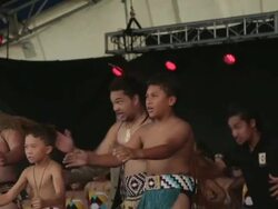 Mid shot of Maori warriors performing traditional Stock Footage