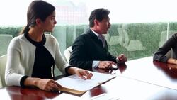 MS PAN Colleagues in discussion during meeting in office conference room Stock Footage