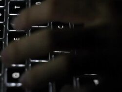 Hand typing a laptop Stock Footage