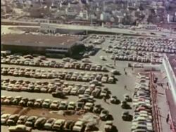 Parking and shopping at the outdoor shopping mall Stock Footage