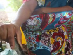 Woman roasting coffee grains for coffee ceremony Stock Footage