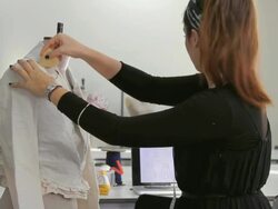 Fashion Designer working in studio Stock Footage