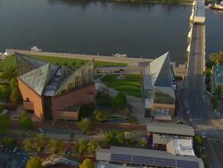 WS AERIAL View of buildings of Tennessee Aquarium complex on Tennessee River / Chattanooga, Tennessee, United States Stock Footage