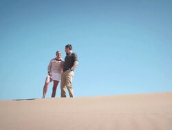 Couple in desert Stock Footage