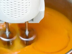 beating dough by electric whisk Stock Footage