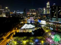 Elevated view over the Entertainment district of Clarke Quay, the Singapore river and City Skyline, Singapore, South East Asia Stock Footage