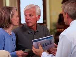 MS TU Concerned senior couple talking with financial planner in home living room / Richmond, Virginia, United Sates Stock Footage