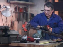 HD DOLLY: Toolmaker Drilling In His Workshop Stock Footage