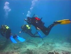 Extreme tourism.Scuba diver explore the ocean floor Stock Footage
