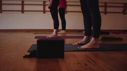 Close-up of feet in yoga studio Stock Footage