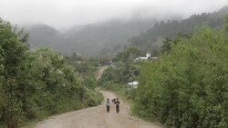 Walking Up Dirt Road Stock Footage