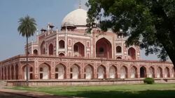 A walking towards pov of Humayun's Tomb, a UNESCO world heritage site in India Stock Footage