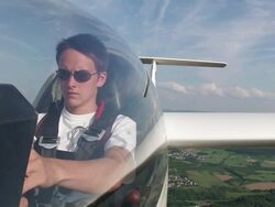 MS Man sitting on sailplane in air / Konz-Koenen, Saar-Valley, Rhineland-Palatinate, Germany Stock Footage