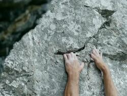 Rock Climber Close-up (4K/UHD to HD) Stock Footage