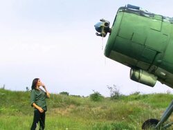Young Woman and Plane without a Propeller Stock Footage