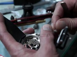 HD: Watchmaker is changing battery Stock Footage