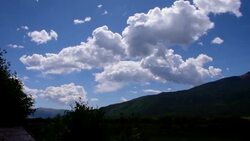 Valley of Twin Lake Summer Cumulus Clouds building over head Colorado Rocky Mountain Weather Stock Footage