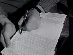 B/W 1960s close up man's hand writing on enlistment form / Vietnam War / newsreel Stock Footage