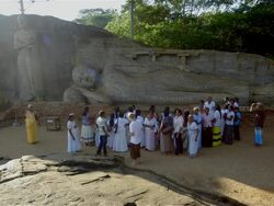 TOURISTS AT CROSS ARMED AND SLEEPING BUDDHA Stock Footage