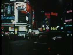 Piccadilly circus at night, lights, London, UK, 1963 Stock Footage