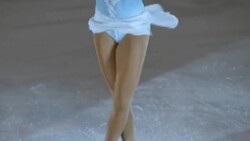 SLO MO LD Female figure skater performing an upright spin Stock Footage