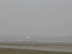 WS TS View of Turkish Airplane landing / Riga, Latvia Stock Footage