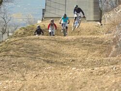 HD Super Slow-Mo: Race Start Of Four Cross MTB Stock Footage