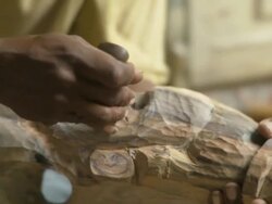 CU PAN R/F Man carving wood scuplture / Havana, Cuba Stock Footage