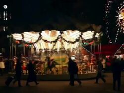 Carnival at night  - Carousel with may people Stock Footage