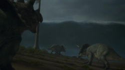 A tsunami crashes over a shoreline and kills several dinosaurs in a computer generated animation. Stock Footage