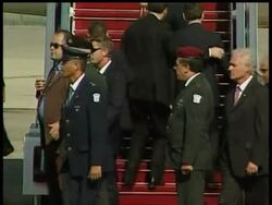 Israeli security guards have whisked French President Nicholas Sarkozy and Israeli Prime Minister Ehud Olmert away during an airport departure ceremony. News Clip