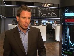 Frankfurt closes, trader reax, Merkel addresses parliament News Clip