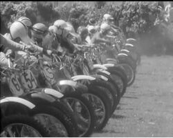 MOTOR-CYCLE SCRAMBLE News Clip