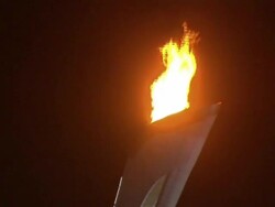 Sochi Olympic Flame Burning At Night News Clip