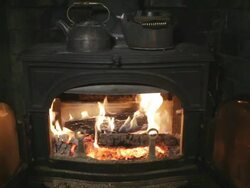 Fire burning in old-fashioned stove Stock Footage