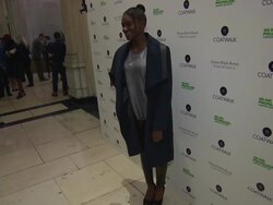 INTERVIEW - Dina Asher-Smith on her dreams of becoming an Olympian at Coatwalk - runway fashion show Stock Footage