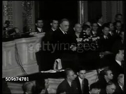 1941: WORLD WAR II SPEECH: EXT Capitol building. WS President Franklin D. Roosevelt behind podium SOT 'Hostilities exist. There is no blinking at the fact that our people, our territory...in grave danger...Confident...will gain...so help us God.' Instructional Video
