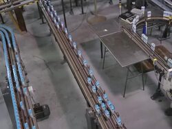 MS Rows of automated lines of baking mix boxes moving to left and right / Chelsea, Michigan, United States Stock Footage